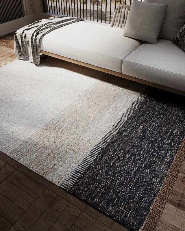 Defining Grandeur: Using Rugs to Zone and Expand Your Space