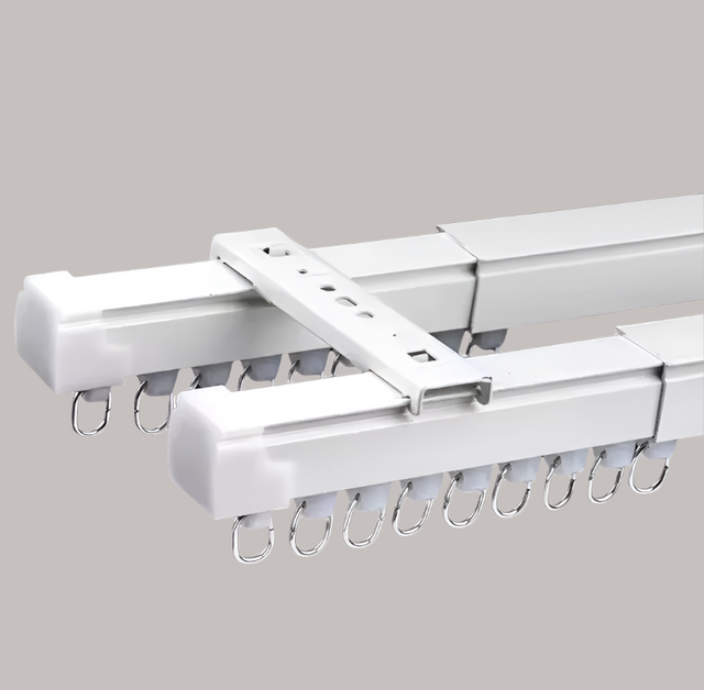 White metal rod with hooks on a white background