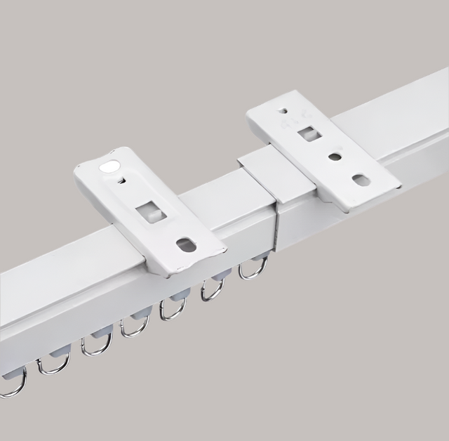 White curtain rod with brackets on a white background
