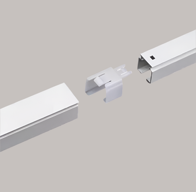Metallic rail system with connectors on a white background